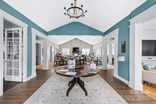 1712 Askern Ct, Waxhaw, NC 28173 - living area featuring dark wood-style flooring, lofted ceiling, a chandelier, baseboards, and recessed lighting