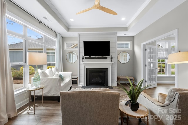 1712 Askern Ct, Waxhaw, NC 28173 - living room with wood finished floors, healthy amount of natural light, and ornamental molding