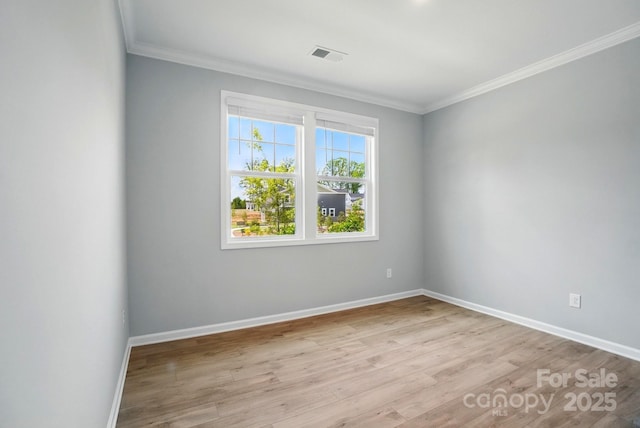 9957 Cask Way, Huntersville, NC 28078 - empty room featuring crown molding, light wood-style flooring, and baseboards