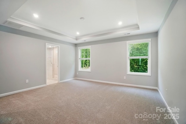 9957 Cask Way, Huntersville, NC 28078 - spare room with a tray ceiling, carpet flooring, baseboards, and recessed lighting