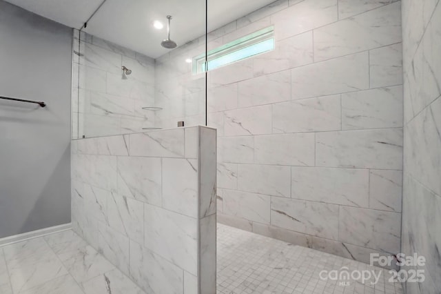 9957 Cask Way, Huntersville, NC 28078 - bathroom featuring a walk in shower, marble finish flooring, and baseboards