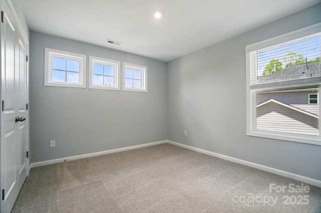 9957 Cask Way, Huntersville, NC 28078 - carpeted spare room with healthy amount of natural light and baseboards