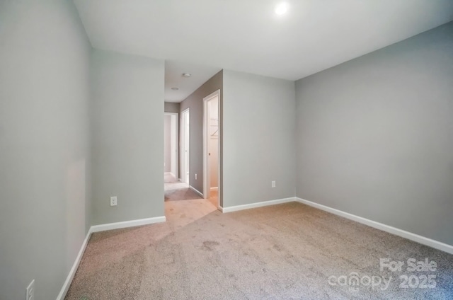 9957 Cask Way, Huntersville, NC 28078 - empty room with light carpet and baseboards