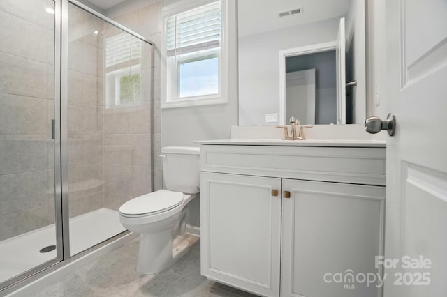 9957 Cask Way, Huntersville, NC 28078 - bathroom with vanity, toilet, a shower stall, and tile patterned floors