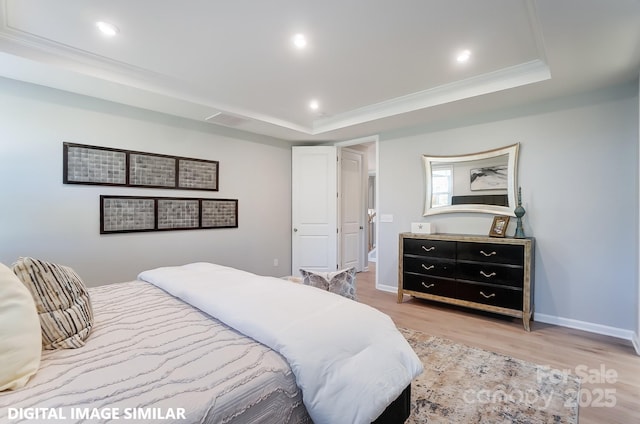 9842 Quercus Ln, Huntersville, NC 28078 - bedroom with a tray ceiling, light wood finished floors, baseboards, crown molding, and recessed lighting