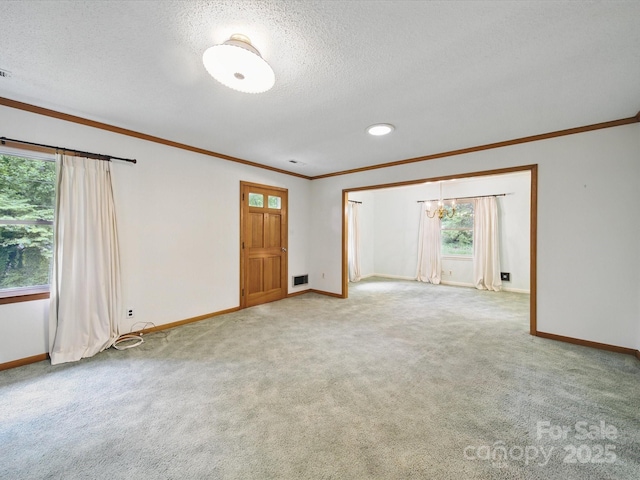 220 Lakeview Dr, Belmont, NC 28012 - unfurnished room with baseboards, a textured ceiling, carpet, and crown molding