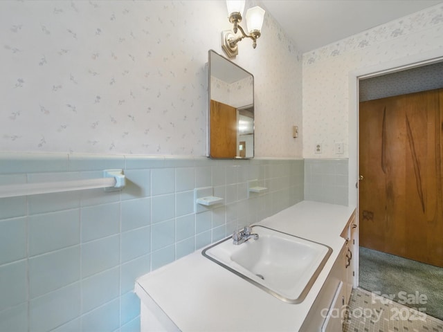 220 Lakeview Dr, Belmont, NC 28012 - bathroom with wallpapered walls, vanity, and a wainscoted wall