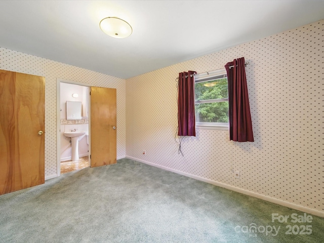 220 Lakeview Dr, Belmont, NC 28012 - unfurnished bedroom featuring carpet floors, a sink, ensuite bath, and wallpapered walls