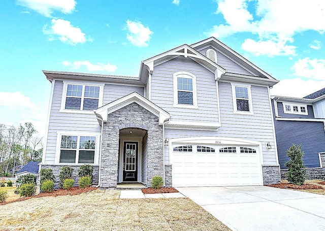 9934 Cask Way, Huntersville, NC 28078 - view of front facade with stone siding, an attached garage, and concrete driveway