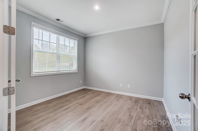 9934 Cask Way, Huntersville, NC 28078 - empty room with crown molding, light wood-type flooring, and baseboards