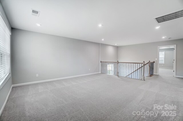 9934 Cask Way, Huntersville, NC 28078 - carpeted spare room featuring baseboards and recessed lighting