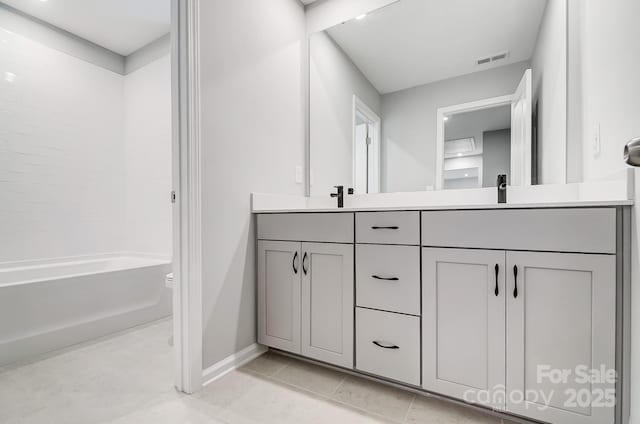 9934 Cask Way, Huntersville, NC 28078 - bathroom featuring double vanity, baseboards, tile patterned floors, bathtub / shower combination, and toilet