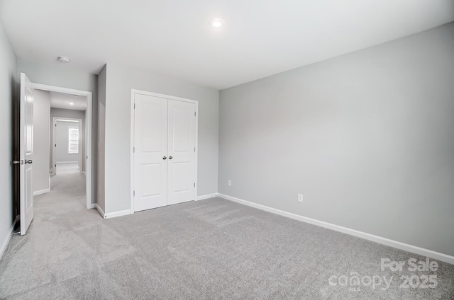 9934 Cask Way, Huntersville, NC 28078 - unfurnished bedroom with carpet, baseboards, a closet, and recessed lighting