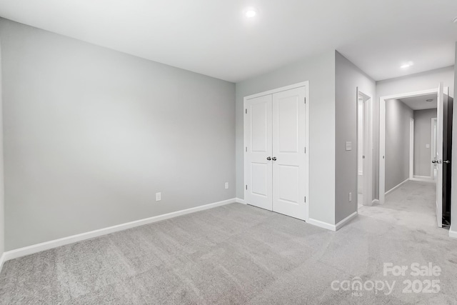 9934 Cask Way, Huntersville, NC 28078 - unfurnished bedroom featuring carpet, baseboards, a closet, and recessed lighting