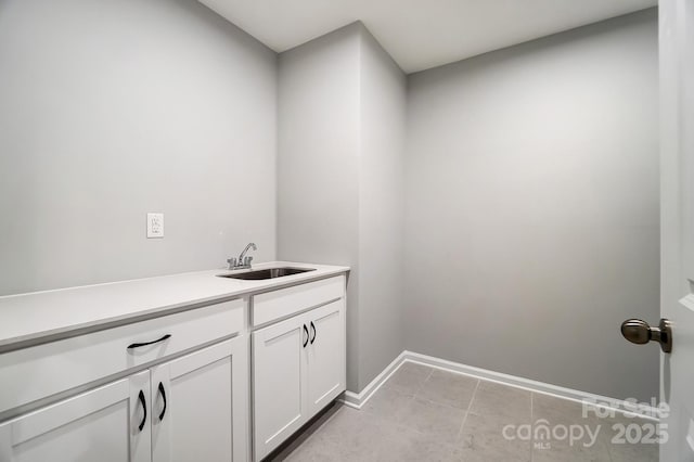 9934 Cask Way, Huntersville, NC 28078 - laundry area with a sink and baseboards
