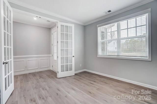 9934 Cask Way, Huntersville, NC 28078 - unfurnished room with french doors, crown molding, and wood finished floors