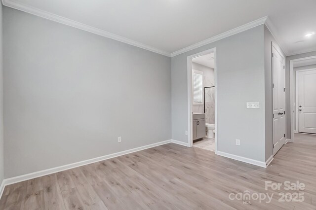 9934 Cask Way, Huntersville, NC 28078 - empty room with light wood finished floors and ornamental molding