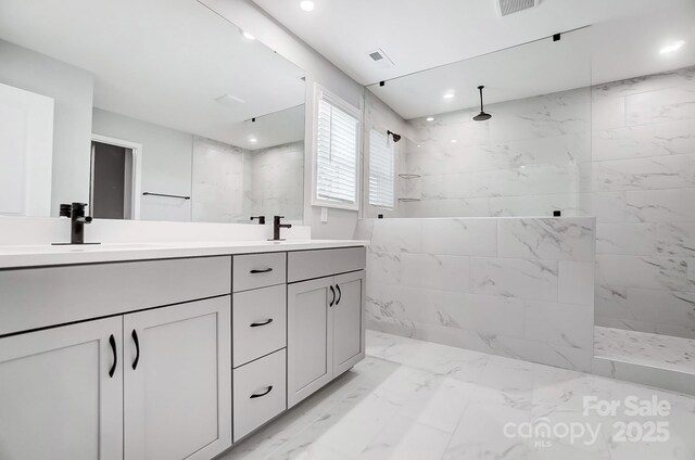 9934 Cask Way, Huntersville, NC 28078 - bathroom featuring double vanity, a marble finish shower, marble finish flooring, and recessed lighting