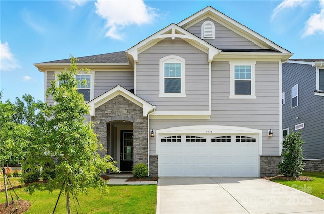 9934 Cask Way, Huntersville, NC 28078 - view of front of house featuring stone siding, driveway, a garage, and a front lawn