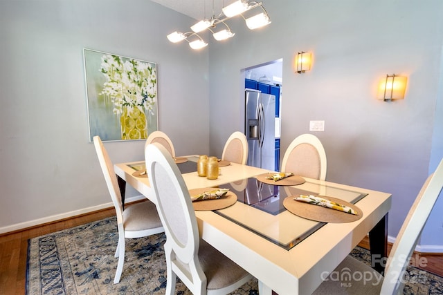 2936 Walsingham Ct, Matthews, NC 28105 - dining space with wood finished floors and a chandelier
