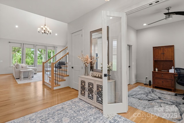 301 Rockbridge Rd Unit 22, Mills River, NC 28759 - foyer featuring stairway, wood finished floors, a ceiling fan, a chandelier, and recessed lighting