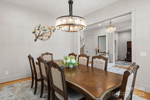 301 Rockbridge Rd Unit 22, Mills River, NC 28759 - dining room featuring a chandelier, baseboards, light wood finished floors, and recessed lighting