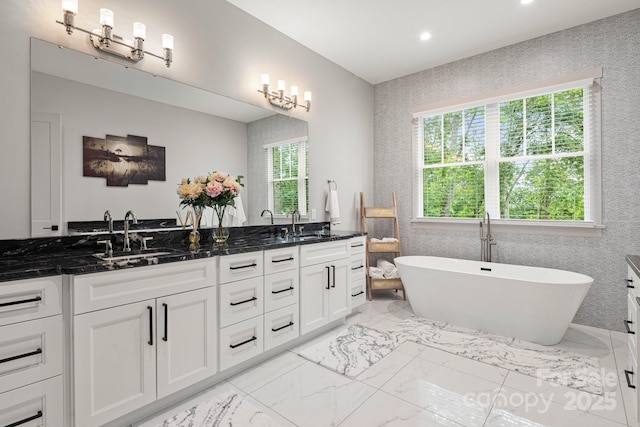 301 Rockbridge Rd Unit 22, Mills River, NC 28759 - full bath featuring double vanity, a freestanding tub, marble finish floors, and recessed lighting