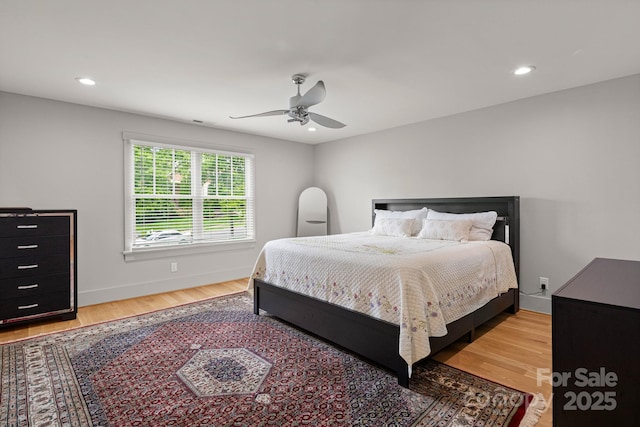 301 Rockbridge Rd Unit 22, Mills River, NC 28759 - bedroom featuring wood finished floors, recessed lighting, a ceiling fan, and baseboards