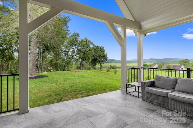 301 Rockbridge Rd Unit 22, Mills River, NC 28759 - view of patio with an outdoor hangout area and a mountain view