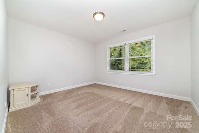1632 Charles Raper Jonas Hwy, Mount Holly, NC 28120 - carpeted spare room featuring baseboards