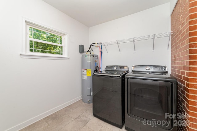 1632 Charles Raper Jonas Hwy, Mount Holly, NC 28120 - laundry area featuring electric water heater, separate washer and dryer, baseboards, and light tile patterned floors