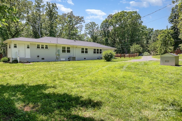 1632 Charles Raper Jonas Hwy, Mount Holly, NC 28120 - rear view of property featuring entry steps, central AC, a lawn, and crawl space