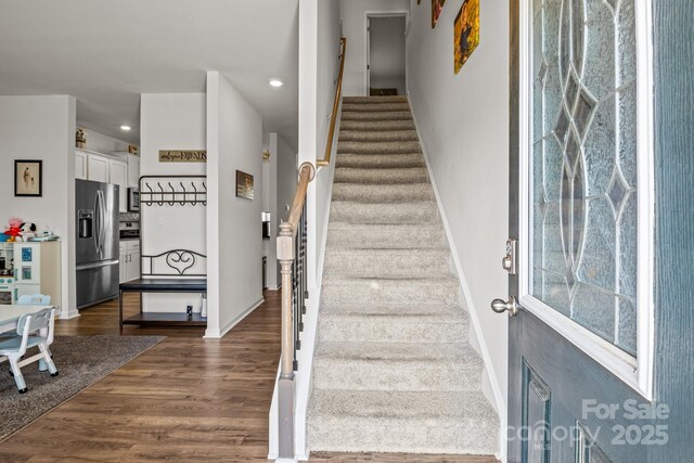 7172 Teague Dr, Gastonia, NC 28056 - stairs featuring recessed lighting, wood finished floors, and baseboards