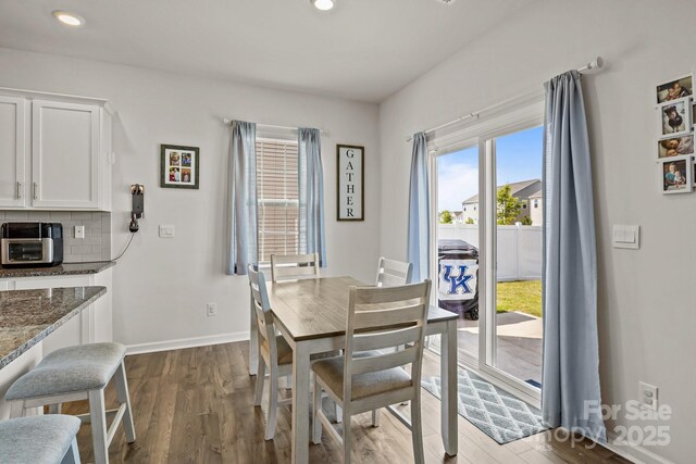 7172 Teague Dr, Gastonia, NC 28056 - dining area with dark wood-style floors, recessed lighting, and baseboards