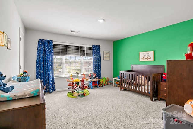 7172 Teague Dr, Gastonia, NC 28056 - carpeted bedroom with a crib and baseboards
