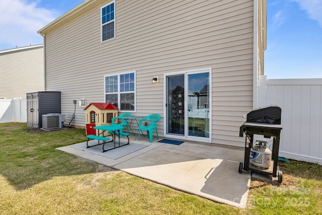 7172 Teague Dr, Gastonia, NC 28056 - back of house featuring central AC and a patio area