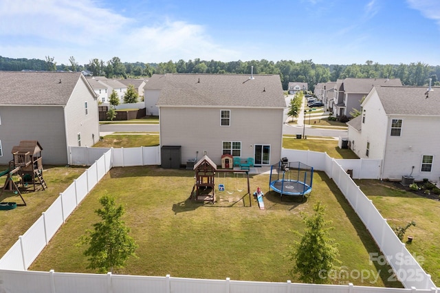 7172 Teague Dr, Gastonia, NC 28056 - rear view of house with a playground, a trampoline, a residential view, and central air condition unit