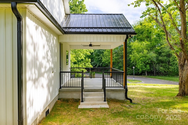 219 Grayson St, Sparta, NC 28675 - porch with a ceiling fan and a yard
