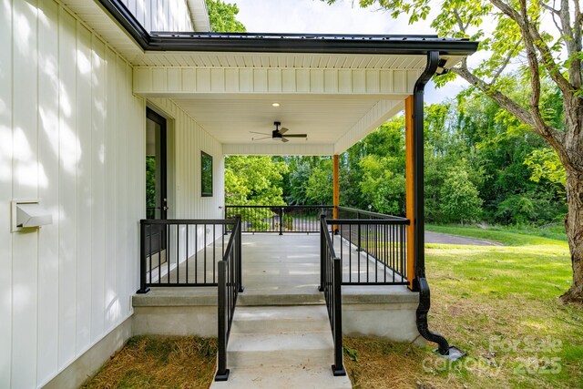 219 Grayson St, Sparta, NC 28675 - porch featuring a ceiling fan and a lawn