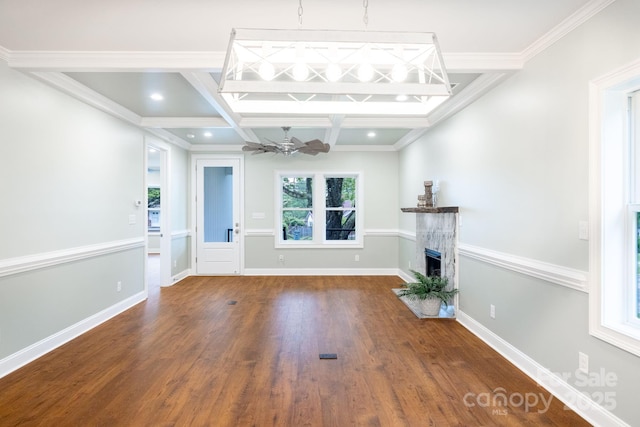 219 Grayson St, Sparta, NC 28675 - unfurnished living room featuring a fireplace, coffered ceiling, wood finished floors, a ceiling fan, and beamed ceiling