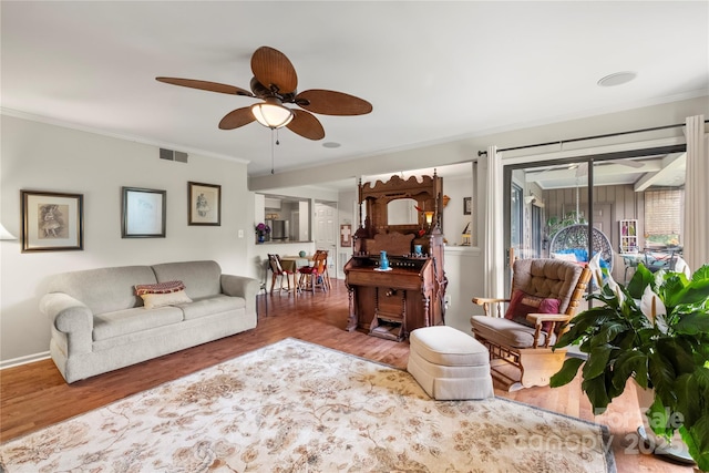 7329 Winery Ln, Charlotte, NC 28227 - living area featuring ceiling fan, ornamental molding, and wood finished floors