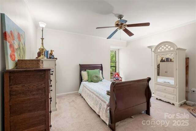 7329 Winery Ln, Charlotte, NC 28227 - bedroom with light carpet, crown molding, baseboards, and a ceiling fan