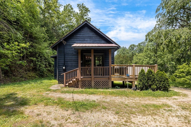 6541 Grassy Branch Rd, Bryson City, NC 28713 - view of front of property featuring a metal roof, a wooden deck, and a wooded view