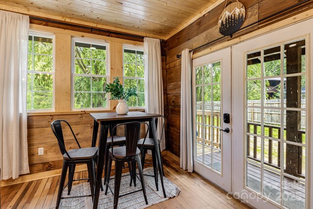 6541 Grassy Branch Rd, Bryson City, NC 28713 - dining area with french doors, wood walls, light wood-type flooring, and wood ceiling