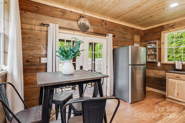 6541 Grassy Branch Rd, Bryson City, NC 28713 - dining space featuring wood walls, wooden ceiling, light wood finished floors, and recessed lighting