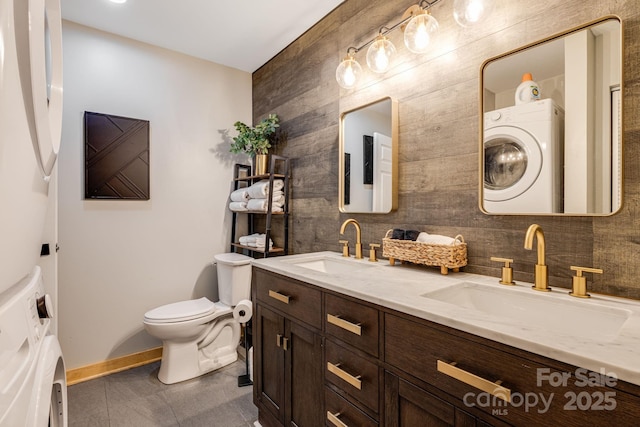 6541 Grassy Branch Rd, Bryson City, NC 28713 - bathroom with washer / dryer, double vanity, and tile patterned floors