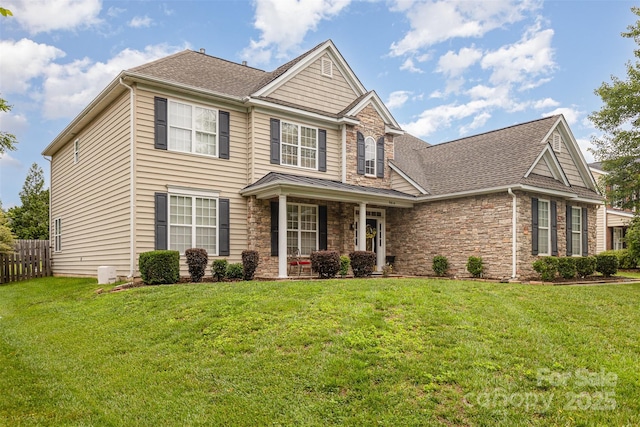 9814 Tompkins Ln, Waxhaw, NC 28173 - view of front of home featuring stone siding, a porch, and roof with shingles