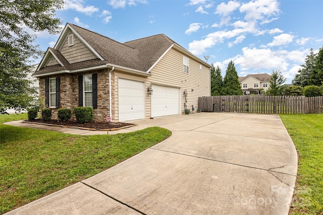 9814 Tompkins Ln, Waxhaw, NC 28173 - view of side of home with stone siding, concrete driveway, and roof with shingles