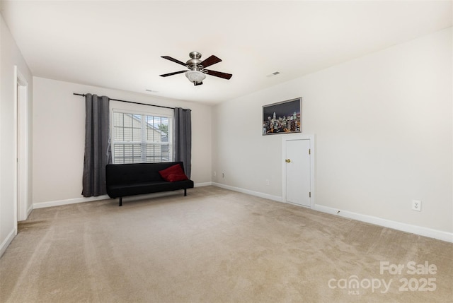 9814 Tompkins Ln, Waxhaw, NC 28173 - spare room with baseboards, light carpet, and a ceiling fan