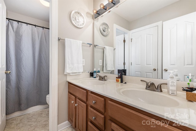 9814 Tompkins Ln, Waxhaw, NC 28173 - full bath featuring toilet, double vanity, and curtained shower